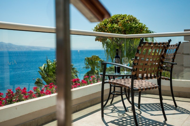 Deluxe suite pool view balcony